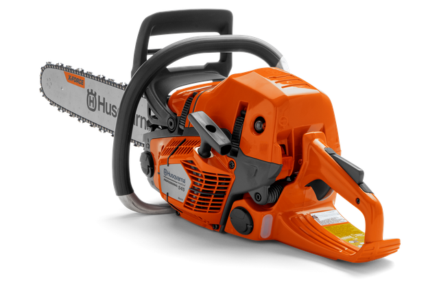 Side view of a Husqvarna chainsaw with ergonomic handle and visible branding.