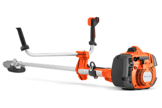 Side view of a Husqvarna brushcutter with ergonomic handles and blade.