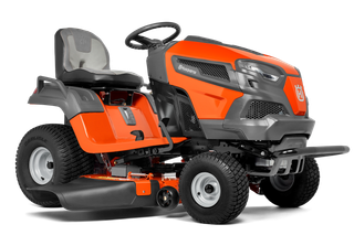 Side view of a Husqvarna ride-on lawn mower with a visible cutting deck.